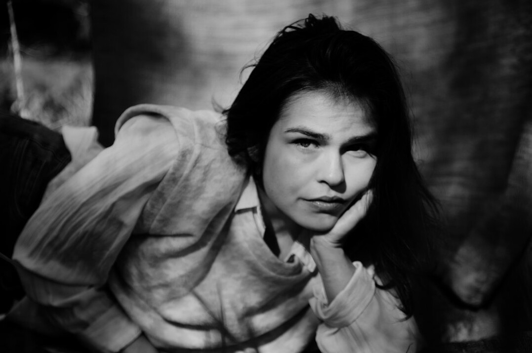 Portrait of a woman in her forties with dark hair
