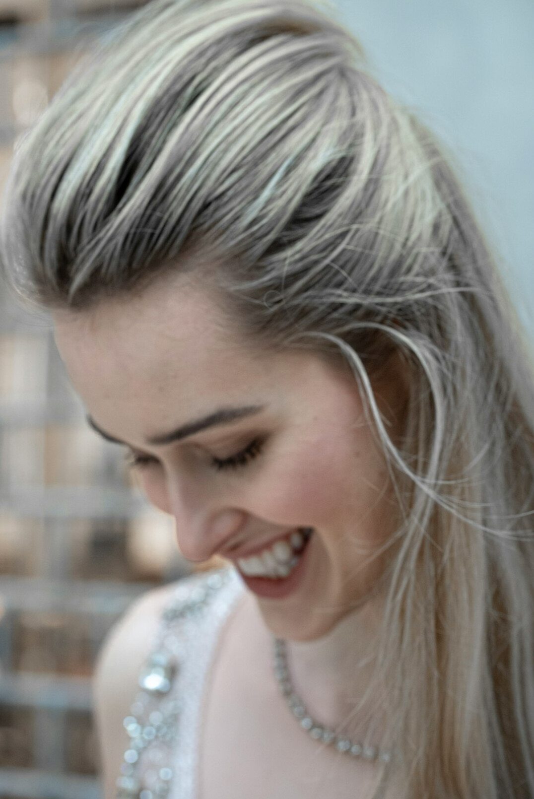Portrait of a smiling woman with light hair